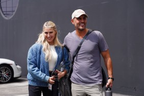 Mauricio Umansky and Emma Slater walking together outside