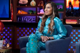 Mary Cosby in a blue bedazzled jumpsuit sitting with her legs crossed on Watch What Happens Live