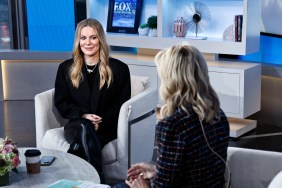 Leah McSweeney in a black sweater sitting on the set of Fox & Friends, Ainsley Earhardt is sitting across from her with her back to the camera