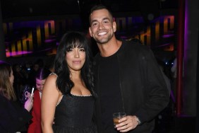 Jesse Solomon and Danielle Olivera posing together and wearing black