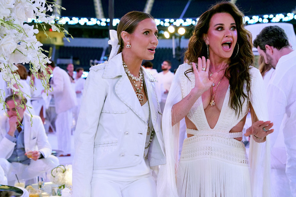 Dorit Kemsley and Kyle Richards at a white party on RHOBH.