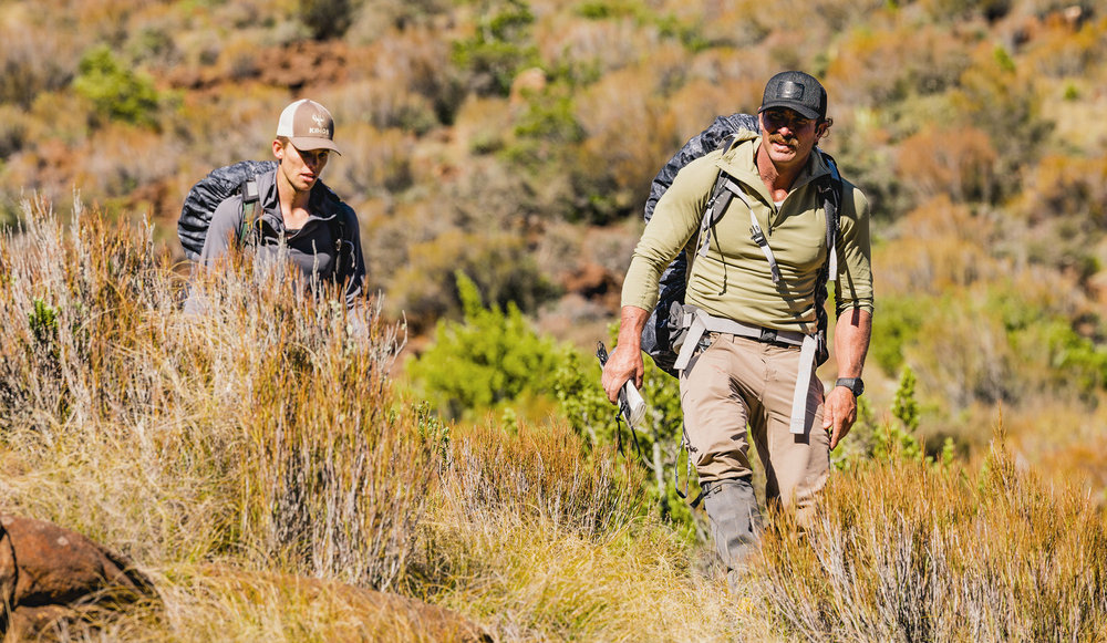 Ryan and Bronsen walking down a hlll on Race to Survive: New Zealand 