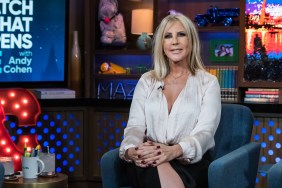 Vicki Gunvalson in a white blouse, siting with her hands in her lap on Watch What Happens Live