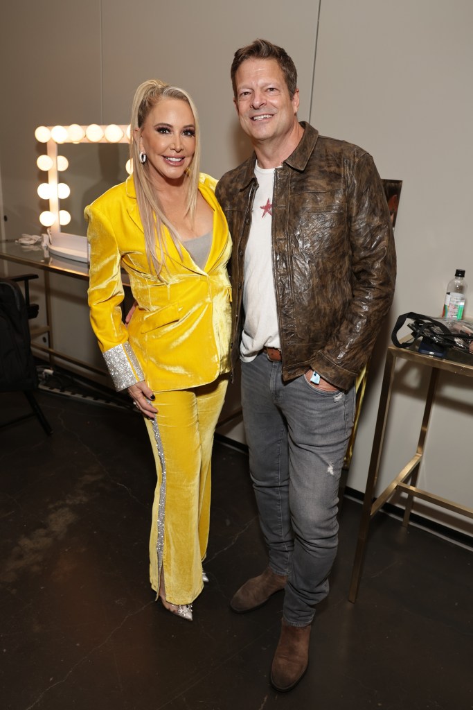 John Janssen and RHOC's Shannon Beador in a yellow suit.