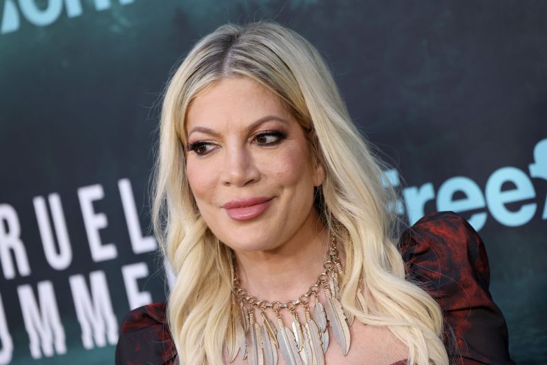 Tori Spelling admits to being too lazy to help her kids.