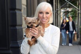 Margaret Josephs holding a little doggie