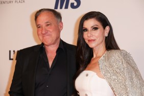 Terry and Heather Dubrow on a red carpet.