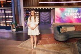 Kelly Clarkson in a white dress on The Kelly Clarkson Show