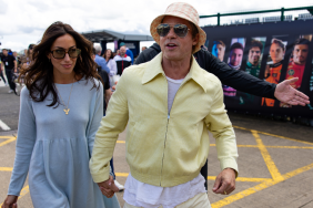 Actor Brad Pitt and girlfriend Ines De Ramon walk in the paddock during the F1 Grand Prix of Great Britain at Silverstone Circuit on July 7, 2024 in Northampton, United Kingdom.