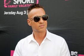 Mike Sorrentino in a white button-up shirt and sunglasses