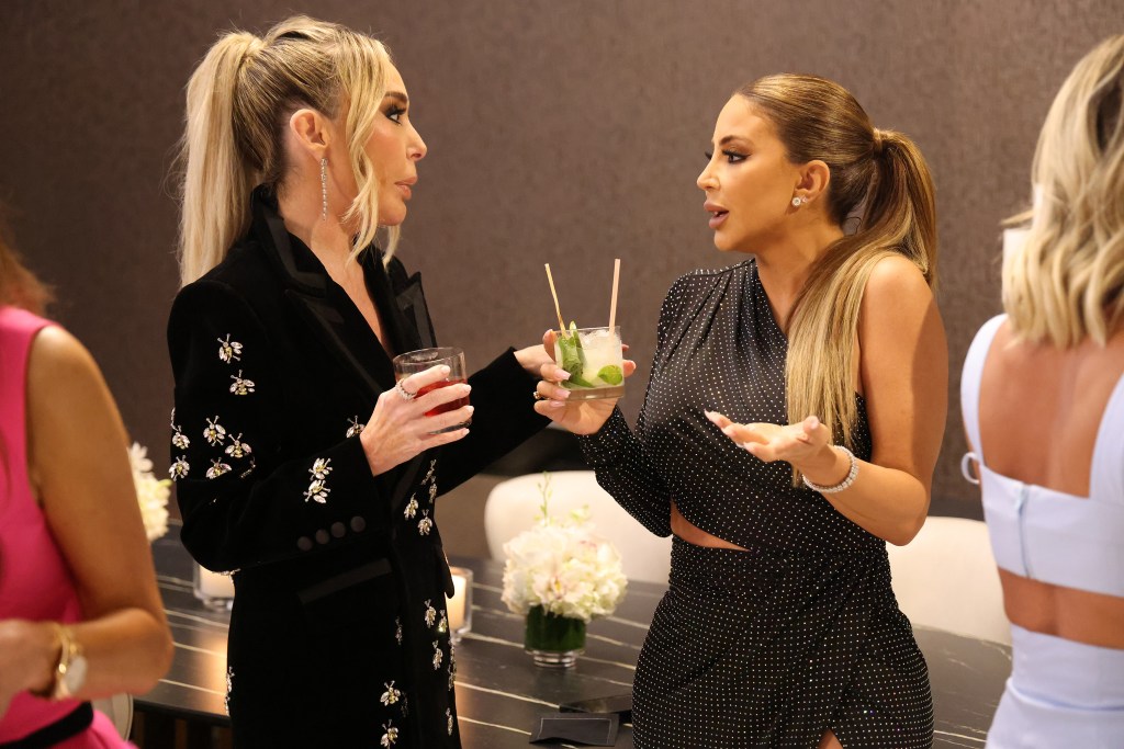 Larsa Pippen and Marysol Patton wearing black and holding drinks on Real Housewives of Miami Season 6