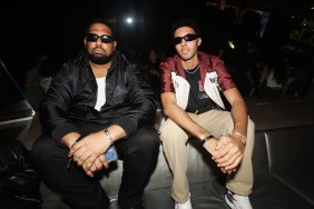 Preston Pippen wearing sunglasses and sitting with Arize at Billboard's No 1 Party