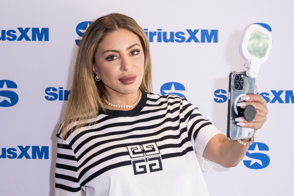 Larsa Pippen and the Larsa Light taking a selfie at SiriusXM