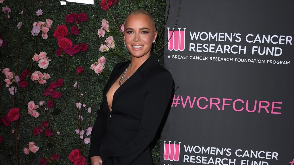 Teddi Mellencamp in a black suit