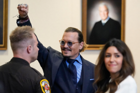 Actor Johnny Depp gestures to spectators in court after closing arguments at the Fairfax County Circuit Courthouse in Fairfax, Virginia, on May 27, 2022. - Actor Johnny Depp is suing ex-wife Amber Heard for libel after she wrote an op-ed piece in The Washington Post in 2018 referring to herself as a public figure representing domestic abuse.