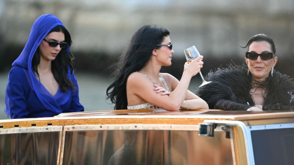 Kendall Jenner (L), US television personality Kris Jenner (R) and US Kylie Jenner leave the Gritti Palace Hotel for a party on the third day of the wedding of US Amazon founder Jeff Bezos with Lauren Sanchez, in Venice on June 28, 2025
