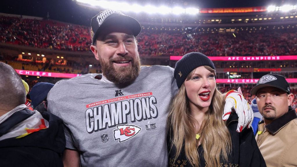 Taylor Swift celebrates with Travis Kelce #87 of the Kansas City Chiefs after defeating the Buffalo Bills 32-29 in the AFC Championship Game at GEHA Field at Arrowhead Stadium on January 26, 2025 in Kansas City, Missouri