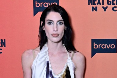 Georgia McCann in a white dress at the premiere of Next Gen NYC